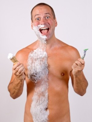 unshaved man with foam